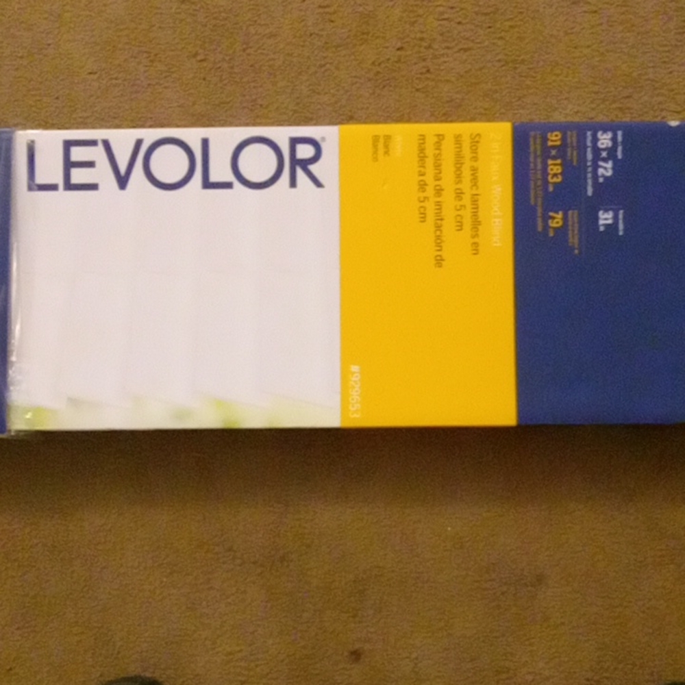 These are Levolor 2 inch Faux Wood Blinds never used still in box.